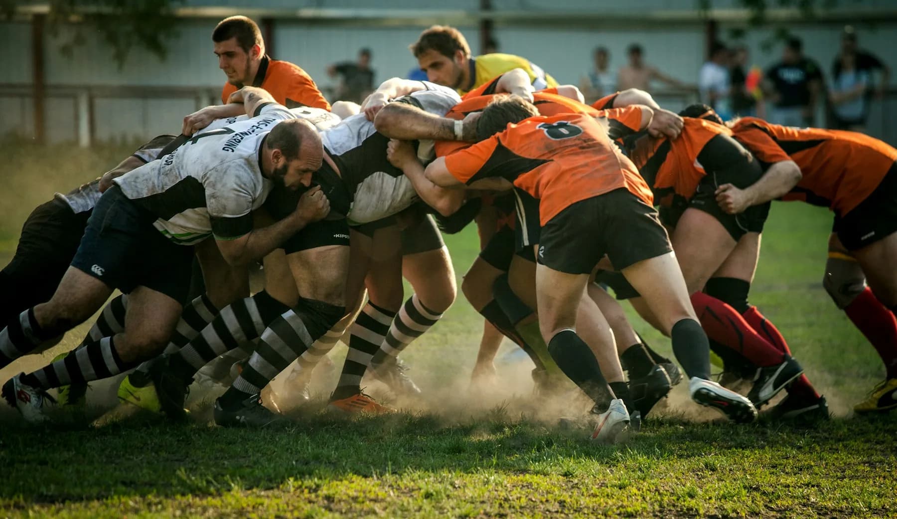 Rugby players engaged in a scrum